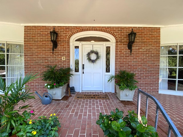 entrance to property with a porch