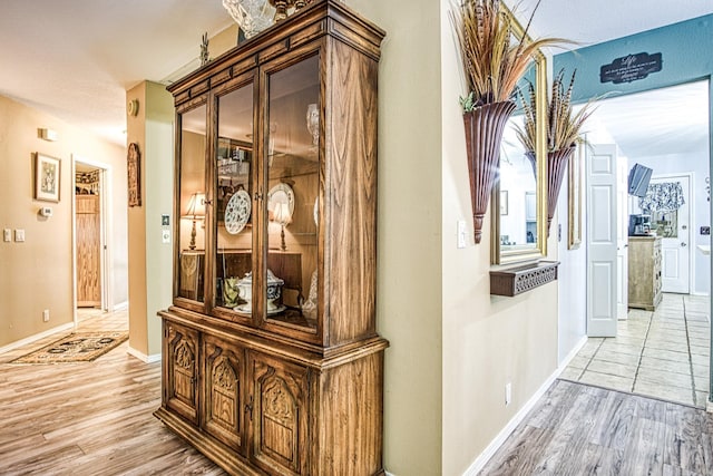 hall featuring light hardwood / wood-style floors