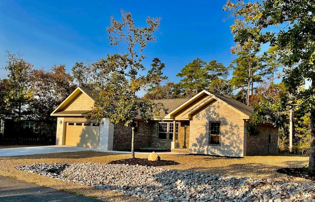 view of front of property with a garage and driveway