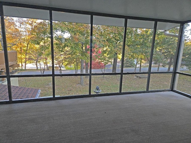 unfurnished sunroom featuring plenty of natural light