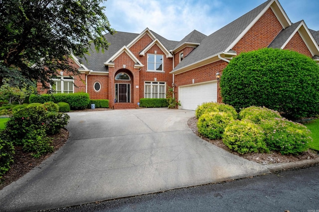 front facade with a garage