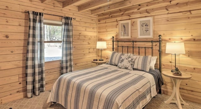 bedroom with wood ceiling, vaulted ceiling with beams, a closet, wood walls, and light colored carpet