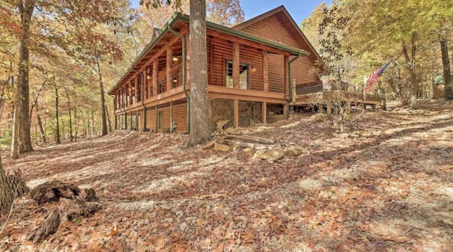 deck featuring a hot tub