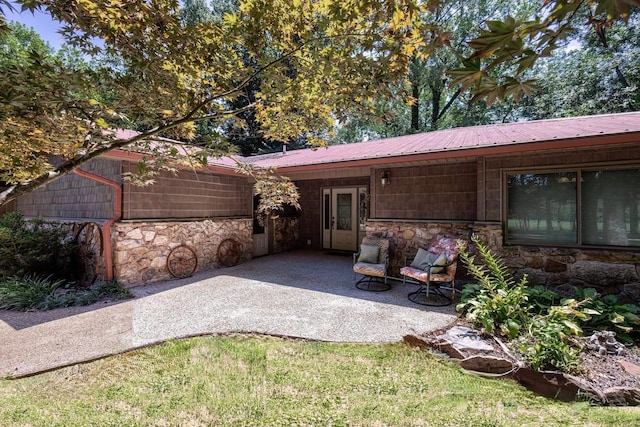 rear view of house featuring a patio