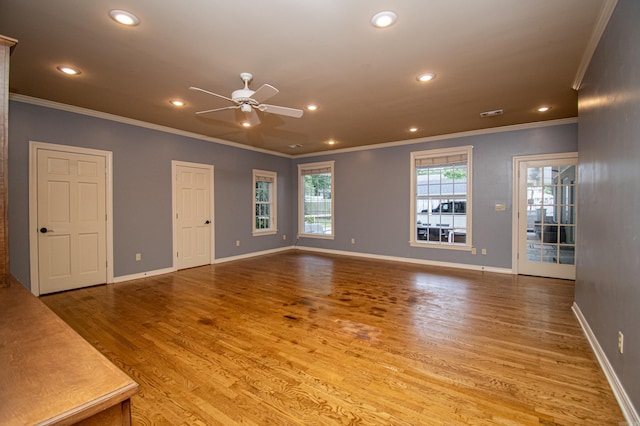 unfurnished living room with baseboards, wood finished floors, a ceiling fan, and recessed lighting