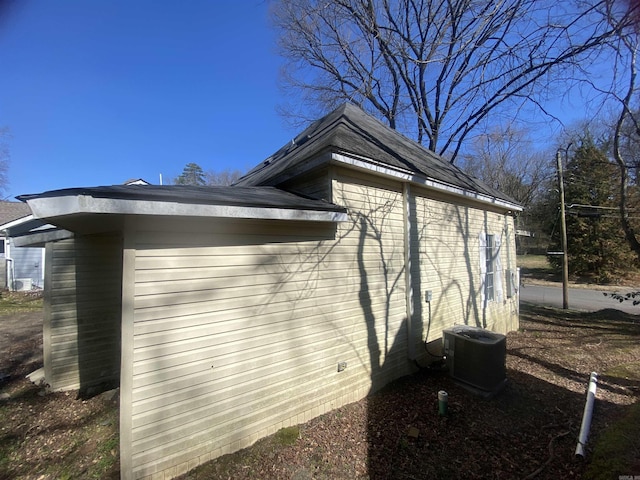 view of home's exterior with cooling unit