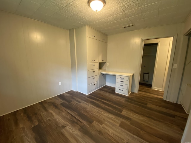 interior space with dark wood-style floors