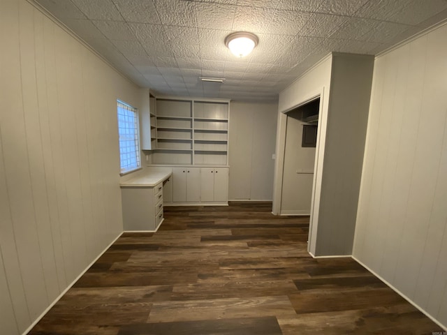 hallway featuring dark wood-type flooring