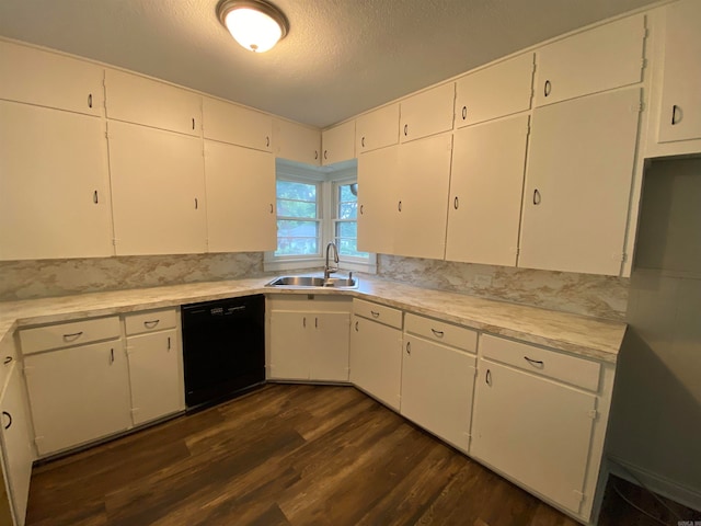 kitchen with sink, dishwasher, white cabinets, and dark hardwood / wood-style floors