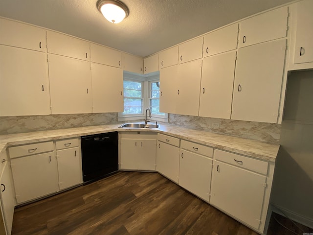 kitchen with a sink, a textured ceiling, black dishwasher, light countertops, and dark wood-style flooring