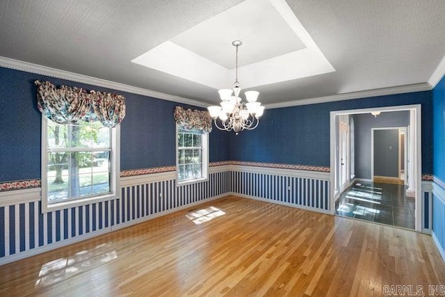 254 S Enid Ave, Russellville, AR 72801 - empty room with a raised ceiling, tile patterned floors, and an inviting chandelier