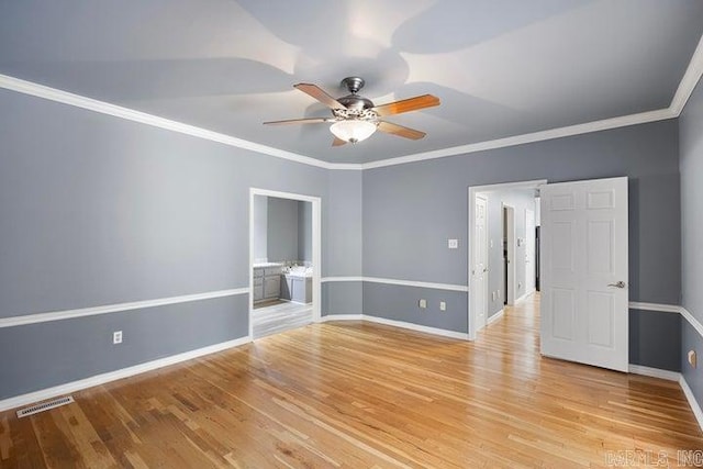 254 S Enid Ave, Russellville, AR 72801 - spare room with light wood-type flooring, ceiling fan, and ornamental molding