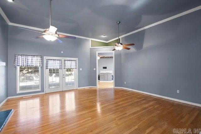 254 S Enid Ave, Russellville, AR 72801 - unfurnished living room featuring french doors, ceiling fan, and hardwood / wood-style flooring