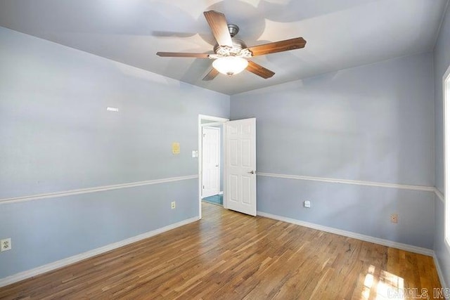 254 S Enid Ave, Russellville, AR 72801 - unfurnished room with wood-type flooring and ceiling fan