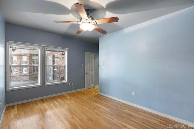 254 S Enid Ave, Russellville, AR 72801 - empty room featuring light hardwood / wood-style flooring and ceiling fan