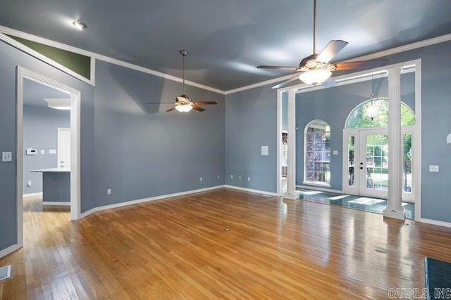 254 S Enid Ave, Russellville, AR 72801 - spare room with crown molding, french doors, ceiling fan, and hardwood / wood-style flooring
