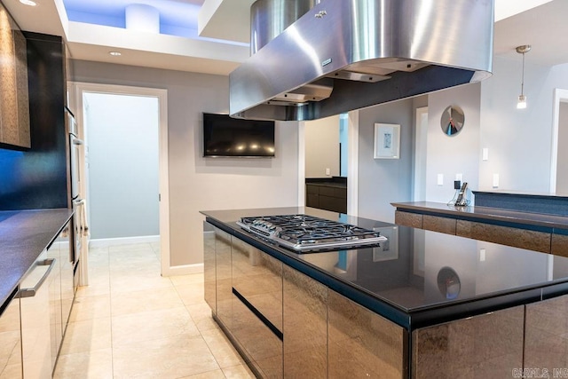 kitchen featuring light tile patterned floors, hanging light fixtures, white dishwasher, island range hood, and stainless steel gas stovetop