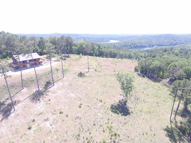 birds eye view of property featuring a rural view