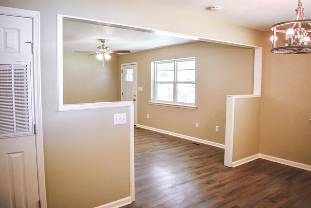 unfurnished bedroom featuring light carpet, ceiling fan, and a textured ceiling