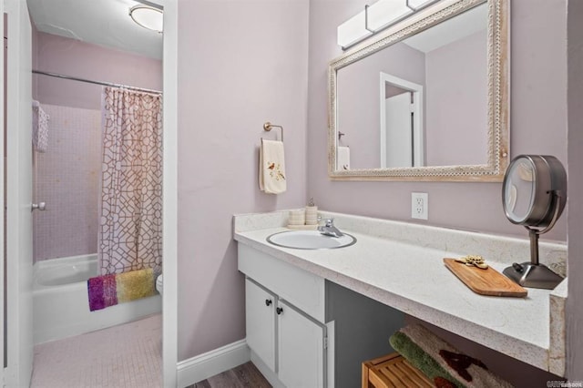 bathroom with shower / bath combo and vanity