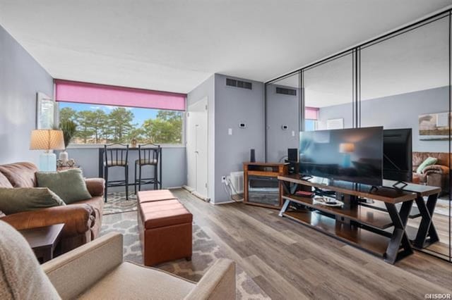 living room with wood-type flooring