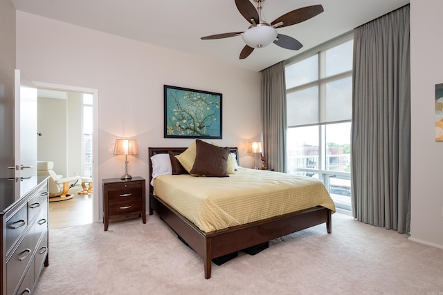 300 Third Unit 708, Little Rock, AR 72201 - bedroom with light carpet and a ceiling fan
