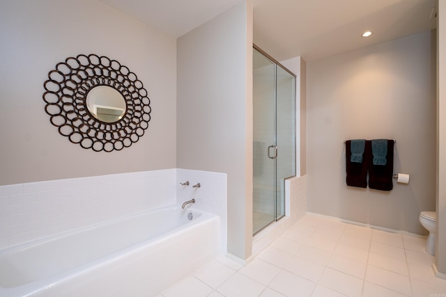 300 Third Unit 708, Little Rock, AR 72201 - full bathroom featuring a bath, a shower stall, toilet, tile patterned floors, and recessed lighting