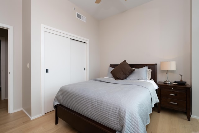 300 Third Unit 708, Little Rock, AR 72201 - bedroom featuring light wood-style floors, baseboards, a closet, and ceiling fan