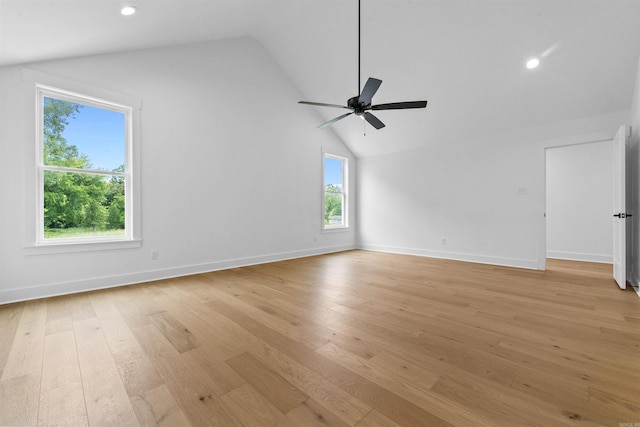 unfurnished living room with lofted ceiling, light hardwood / wood-style floors, and ceiling fan