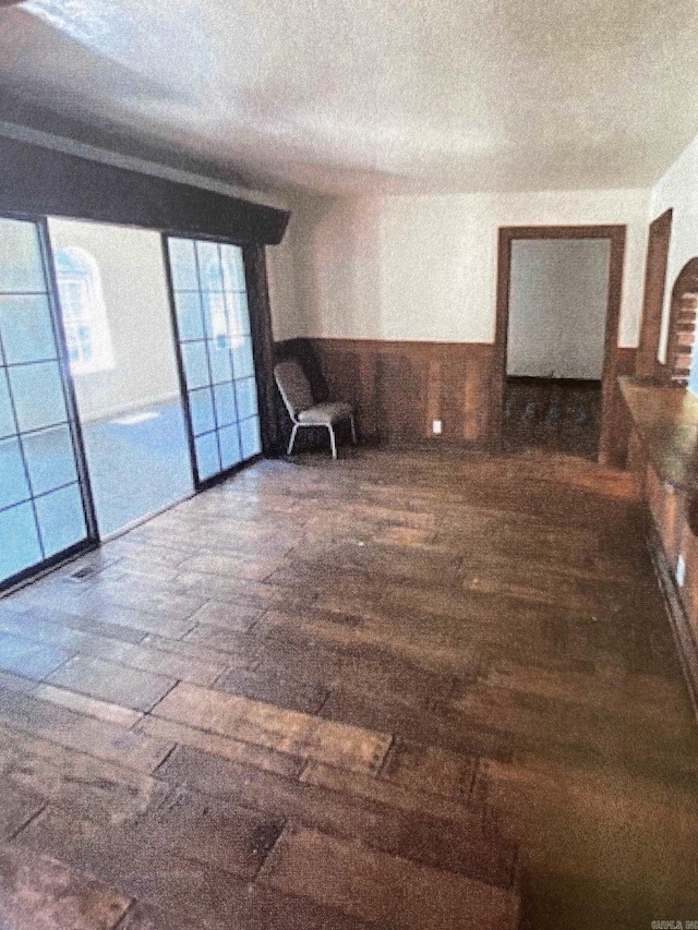 spare room featuring dark hardwood / wood-style floors