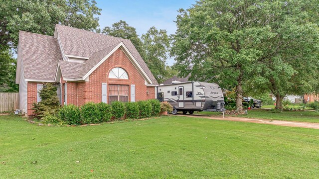 view of front of home with a front yard