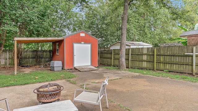 view of outdoor structure with an outdoor fire pit