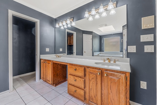 bathroom featuring crown molding, a skylight, vanity, a tub, and tile patterned flooring