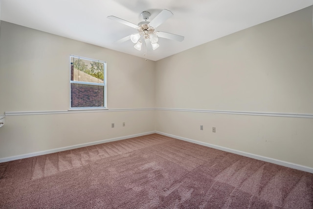 carpeted empty room with ceiling fan