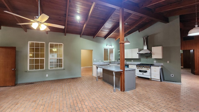 kitchen featuring white cabinets, wall chimney range hood, high vaulted ceiling, and wooden ceiling