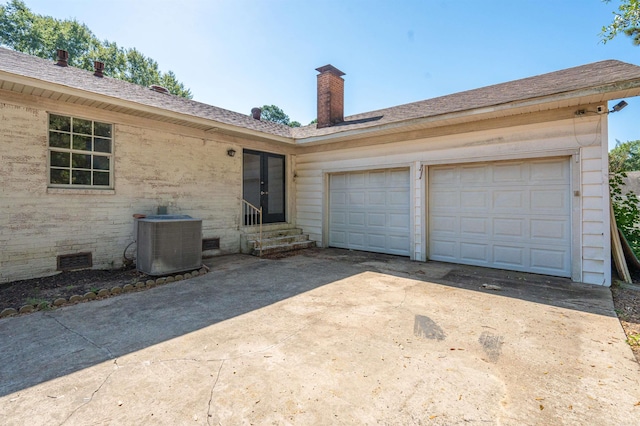 garage featuring central air condition unit