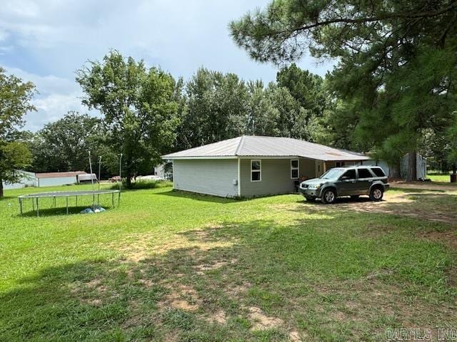 exterior space with a yard