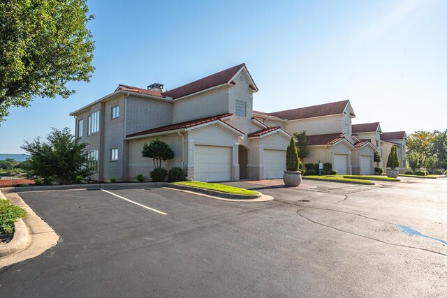 exterior space with a garage