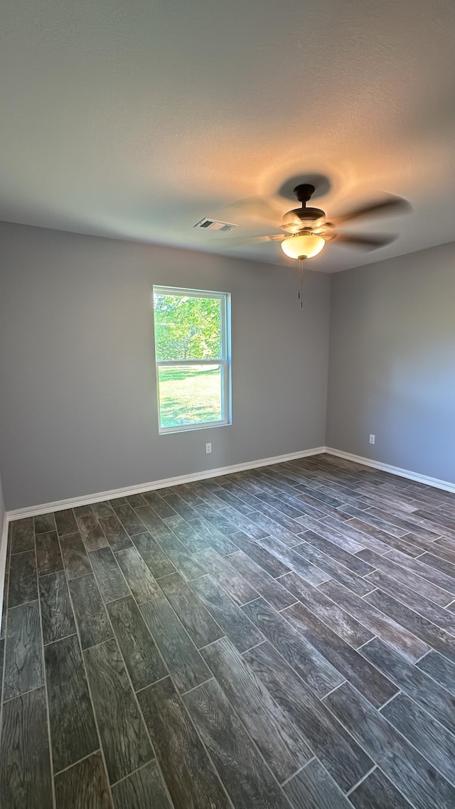 unfurnished room with ceiling fan