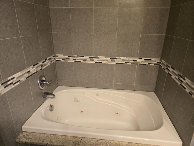 bathroom featuring a tub to relax in