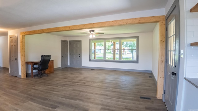 interior space with dark hardwood / wood-style floors