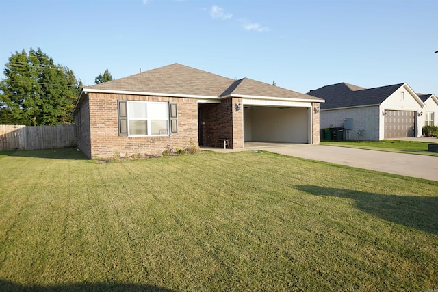 ranch-style house with a garage and a front yard