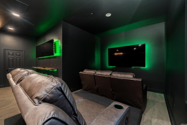 home theater with light hardwood / wood-style flooring