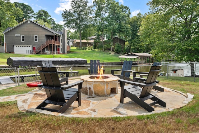 view of patio / terrace with a fire pit