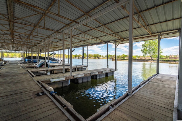 dock area featuring a water view