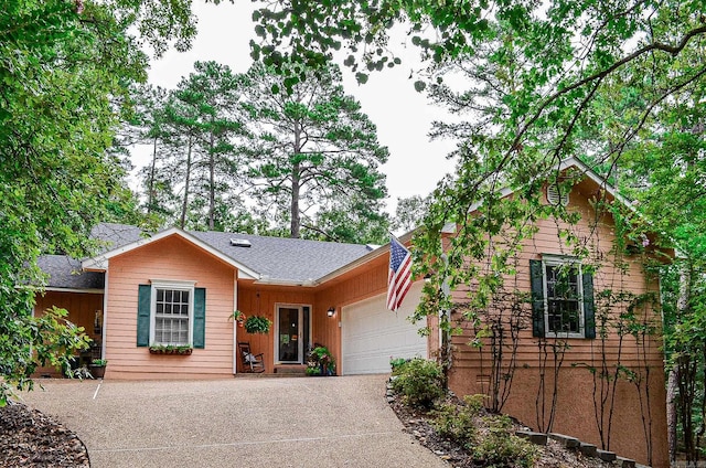 ranch-style house featuring a garage