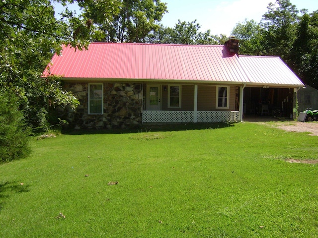 view of front of home with a porch and a front lawn