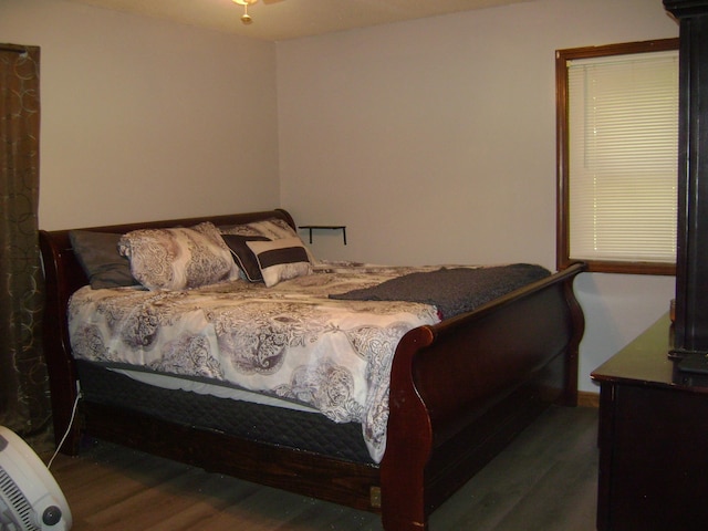 bedroom featuring dark wood-type flooring