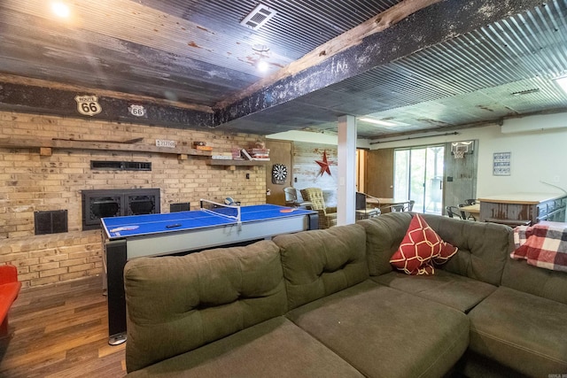 interior space with wood ceiling, brick wall, and dark wood-type flooring