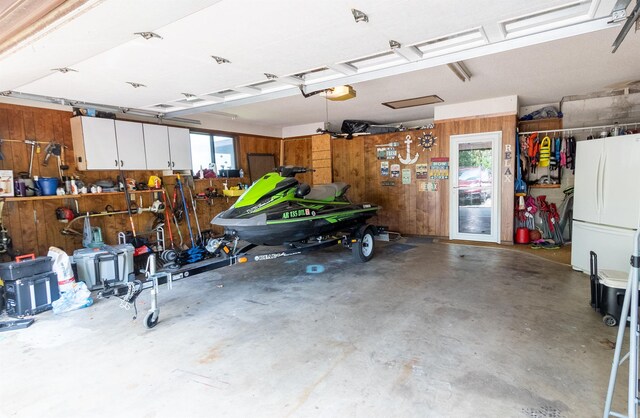 garage with white refrigerator